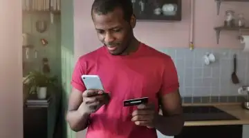 A man using his Santander Everyday Credit Card